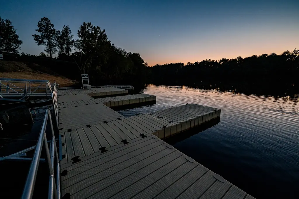 A lake dock at dusk