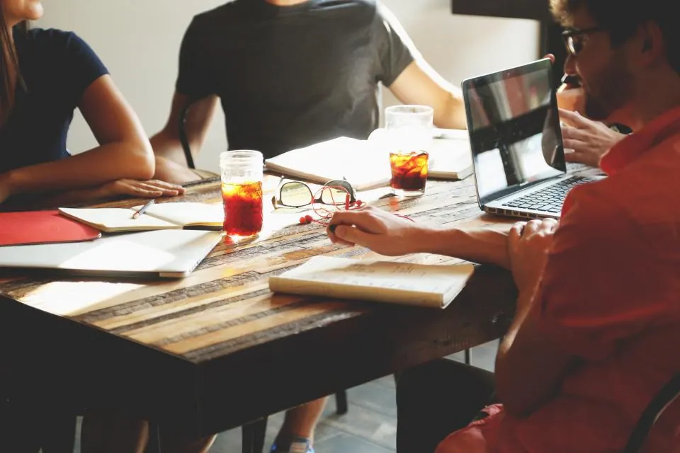 A team working around a table